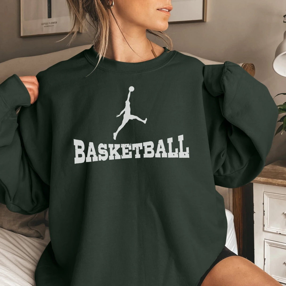 Basic Basketball with Basketball Player Icon on a Sweatshirt with a White Graphic