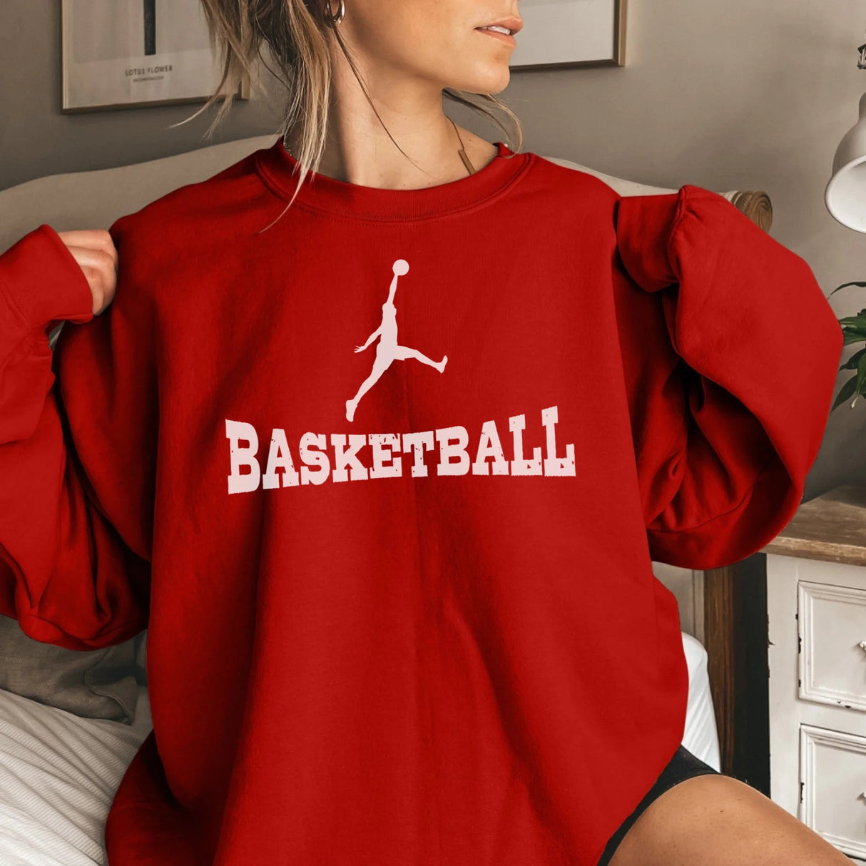 Basic Basketball with Basketball Player Icon on a Sweatshirt with a White Graphic