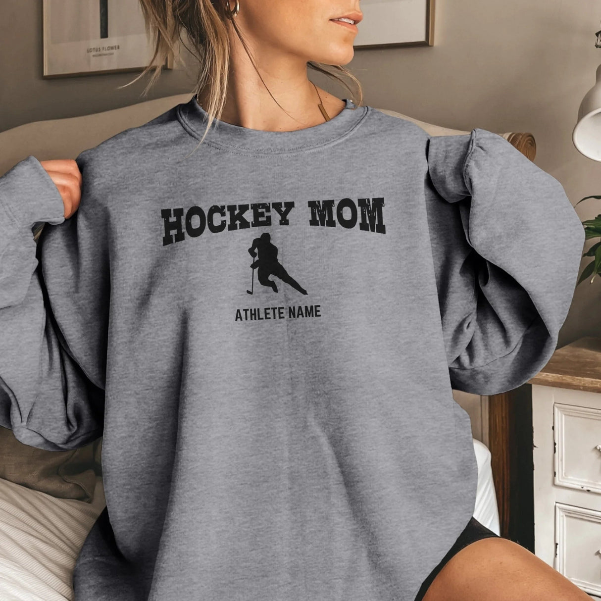 Hockey Mom with Hockey Player Icon and Hockey Player Name on a Sweatshirt with a Black Graphic
