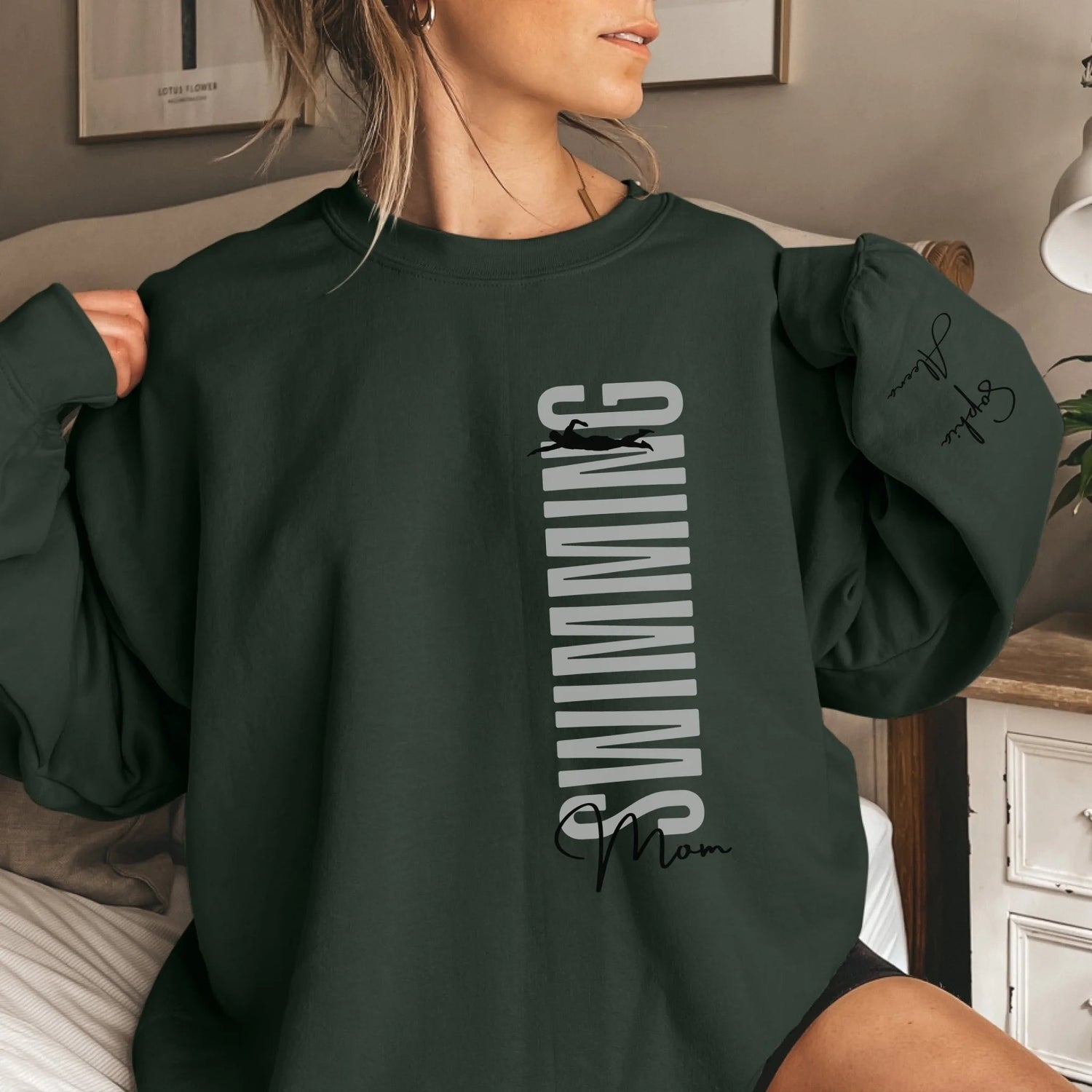 Personalized Swimming Mom on a Sweatshirt With Mascot, Icon, and Swimmer Name on Sleeve on a Sweatshirt