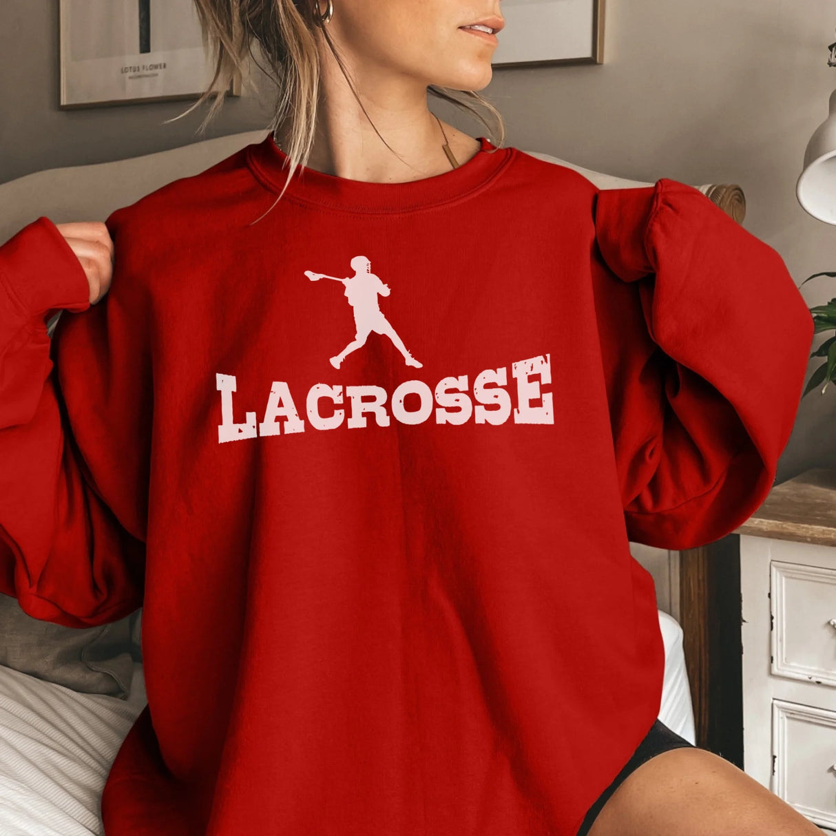 Basic Lacrosse with Lacrosse Player Icon on a Sweatshirt with a White Graphic