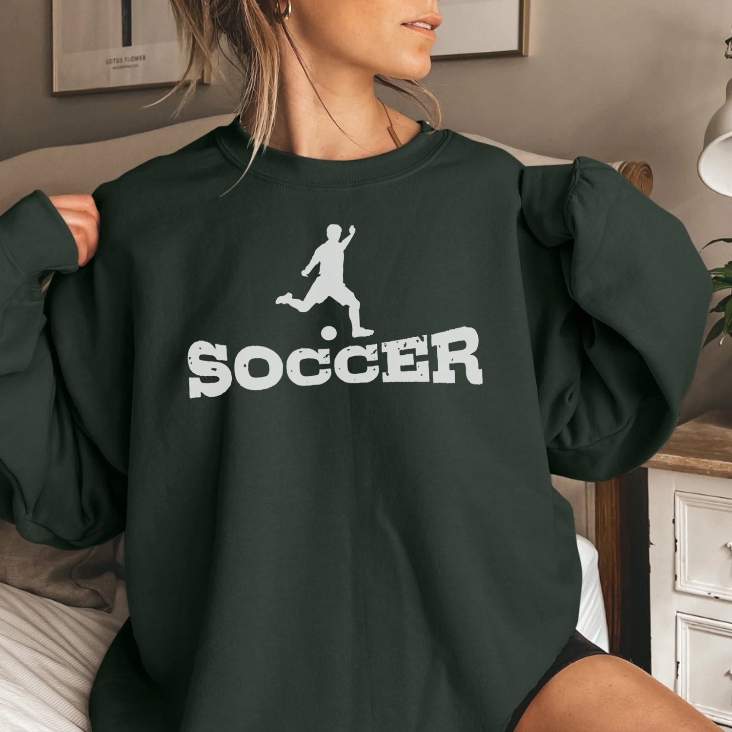 Basic Soccer with Soccer Player Icon on a Sweatshirt with a White Graphic