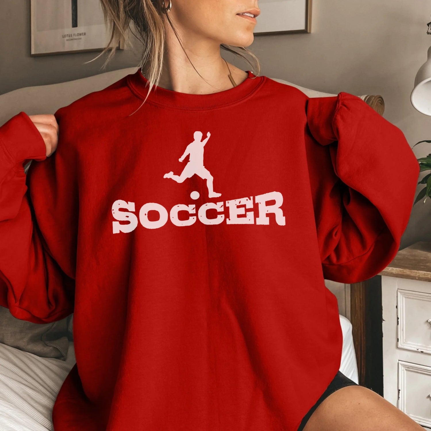 Basic Soccer with Soccer Player Icon on a Sweatshirt with a White Graphic