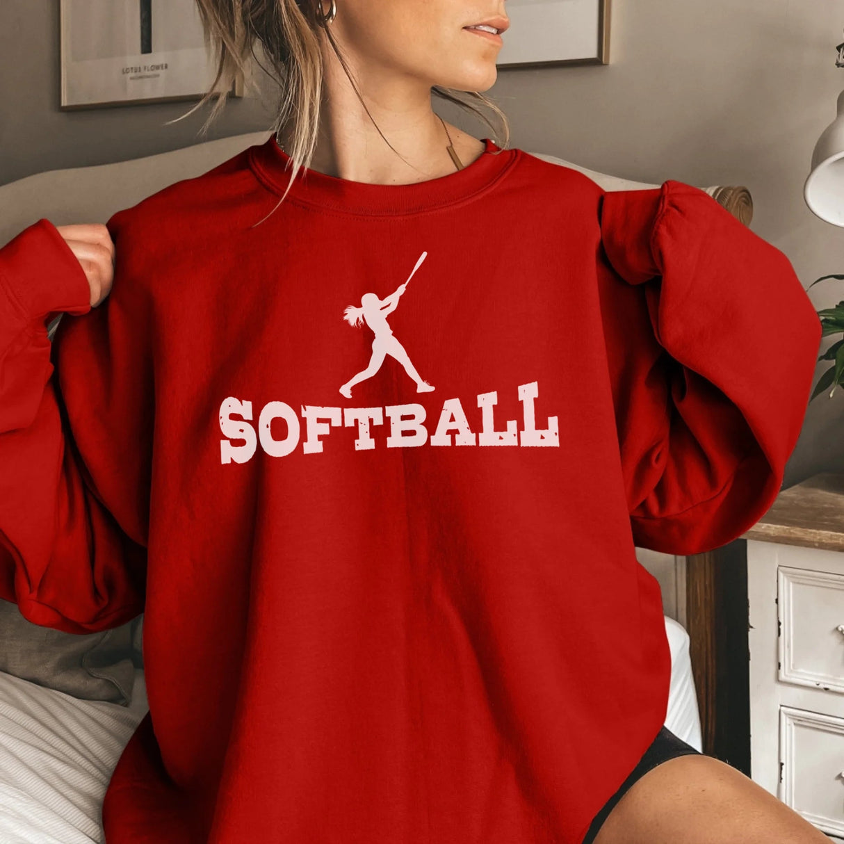 Basic Softball with Softball Player Icon on a Sweatshirt with a White Graphic