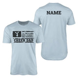 cheer dad horizontal flag with cheerleader name design on a mens t-shirt with a black graphic