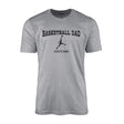 basketball dad with basketball player icon and basketball player name on a mens t-shirt with a black graphic