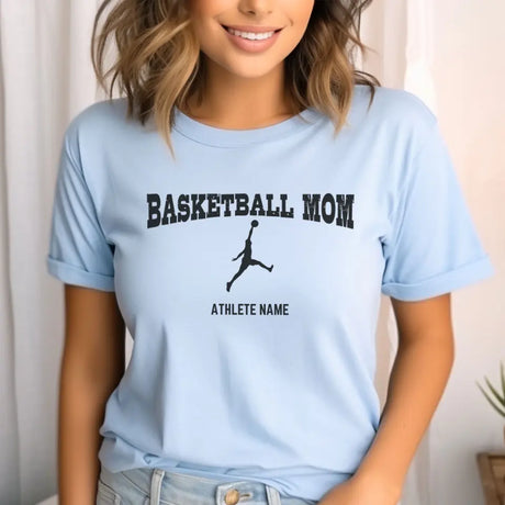 basketball mom with basketball player icon and basketball player name on a unisex t-shirt with a black graphic