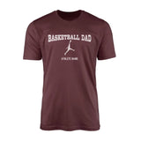 basketball dad with basketball player icon and basketball player name on a mens t-shirt with a white graphic