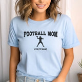 football mom with football player icon and football player name on a unisex t-shirt with a black graphic