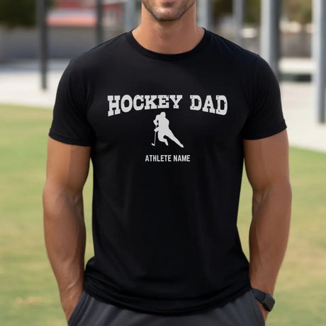 hockey dad with hockey player icon and hockey player name on a mens t-shirt with a white graphic