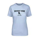 hockey mom with hockey player icon and hockey player name on a unisex t-shirt with a black graphic
