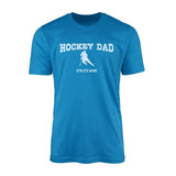 hockey dad with hockey player icon and hockey player name on a mens t-shirt with a white graphic