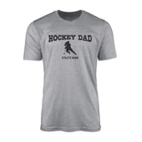 hockey dad with hockey player icon and hockey player name on a mens t-shirt with a black graphic