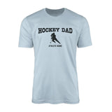 hockey dad with hockey player icon and hockey player name on a mens t-shirt with a black graphic