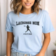 lacrosse mom with lacrosse player icon and lacrosse player name on a unisex t-shirt with a black graphic