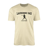 lacrosse dad with lacrosse player icon and lacrosse player name on a mens t-shirt with a black graphic