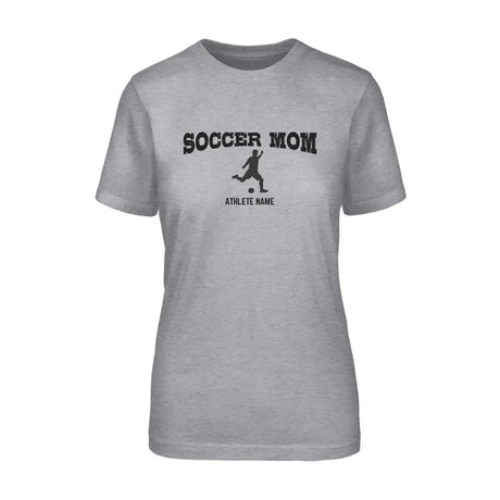 soccer mom with soccer player icon and soccer player name on a unisex t-shirt with a black graphic