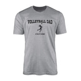 volleyball dad with volleyball player icon and volleyball player name on a mens t-shirt with a black graphic