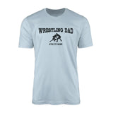 wrestling dad with wrestler icon and wrestler name on a mens t-shirt with a black graphic