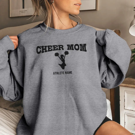 cheer mom with cheerleader icon and cheerleader name on a sweatshirt with a black graphic