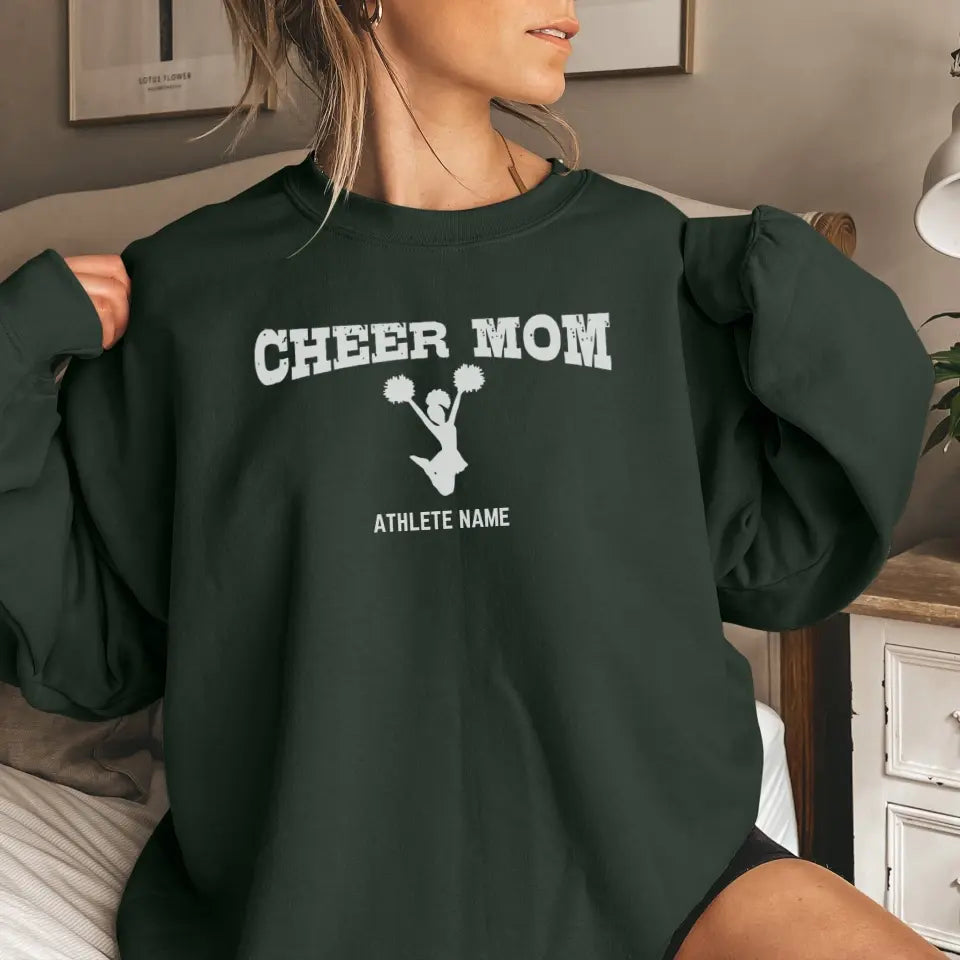 cheer mom with cheerleader icon and cheerleader name on a sweatshirt with a white graphic