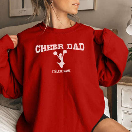 cheer dad with cheerleader icon and cheerleader name on a sweatshirt with a white graphic