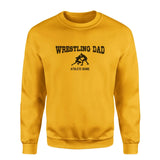 wrestling dad with wrestler icon and wrestler name on a sweatshirt with a black graphic