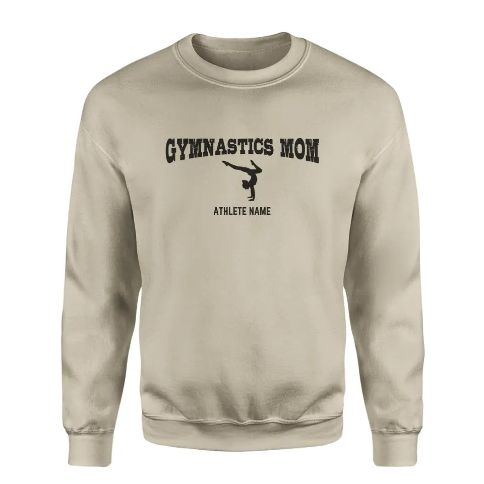 gymnastics mom with gymnast icon and gymnast name on a sweatshirt with a black graphic