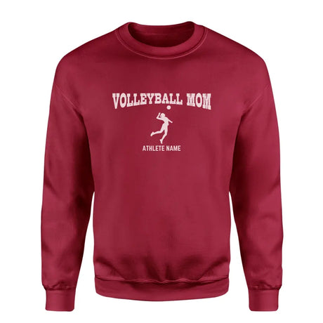 volleyball mom with volleyball player icon and volleyball player name on a sweatshirt with a white graphic