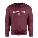 football mom with football player icon and football player name on a sweatshirt with a white graphic