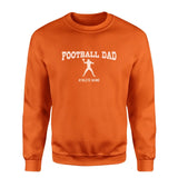 football dad with football player icon and football player name on a sweatshirt with a white graphic