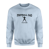 football dad with football player icon and football player name on a sweatshirt with a black graphic