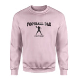 football dad with football player icon and football player name on a sweatshirt with a black graphic