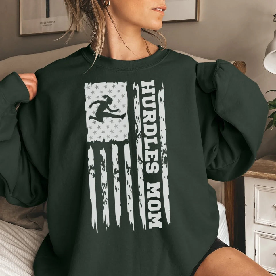 hurdles mom vertical flag on a sweatshirt with a white graphic