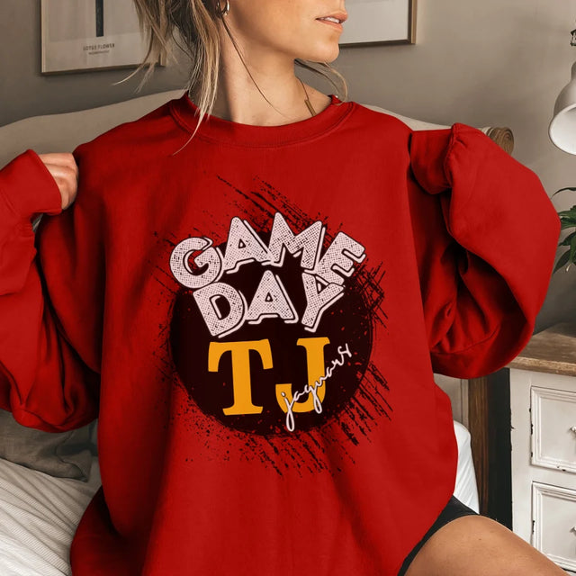 custom distressed game day graphic on a sweatshirt