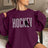 Personalized Hockey on a Sweatshirt With Modern Bold Design and Hockey Player Name on Sleeve on a Sweatshirt