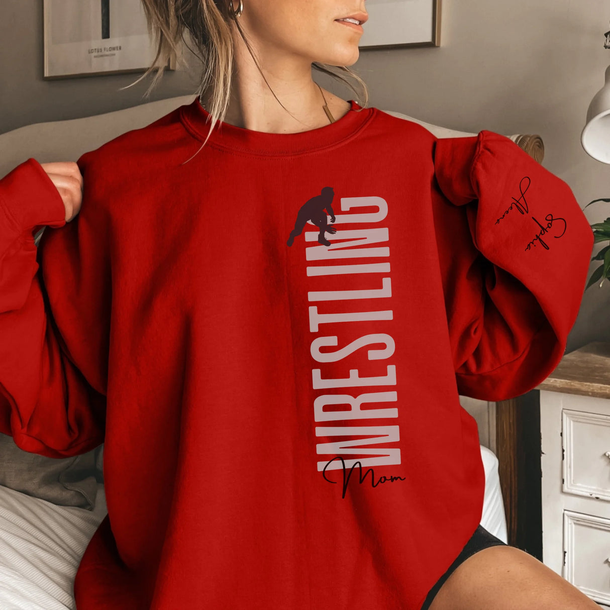 Personalized Wrestling Mom on a Sweatshirt With Mascot, Icon, and Wrestler Name on Sleeve on a Sweatshirt