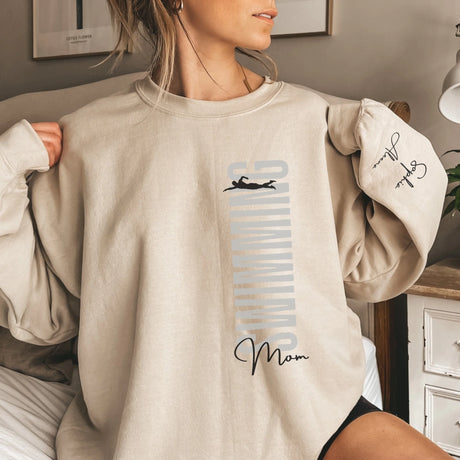 Personalized Swimming Mom on a Sweatshirt With Mascot, Icon, and Swimmer Name on Sleeve on a Sweatshirt