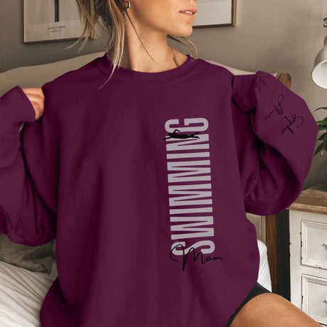 Personalized Swimming Mom on a Sweatshirt With Mascot, Icon, and Swimmer Name on Sleeve on a Sweatshirt