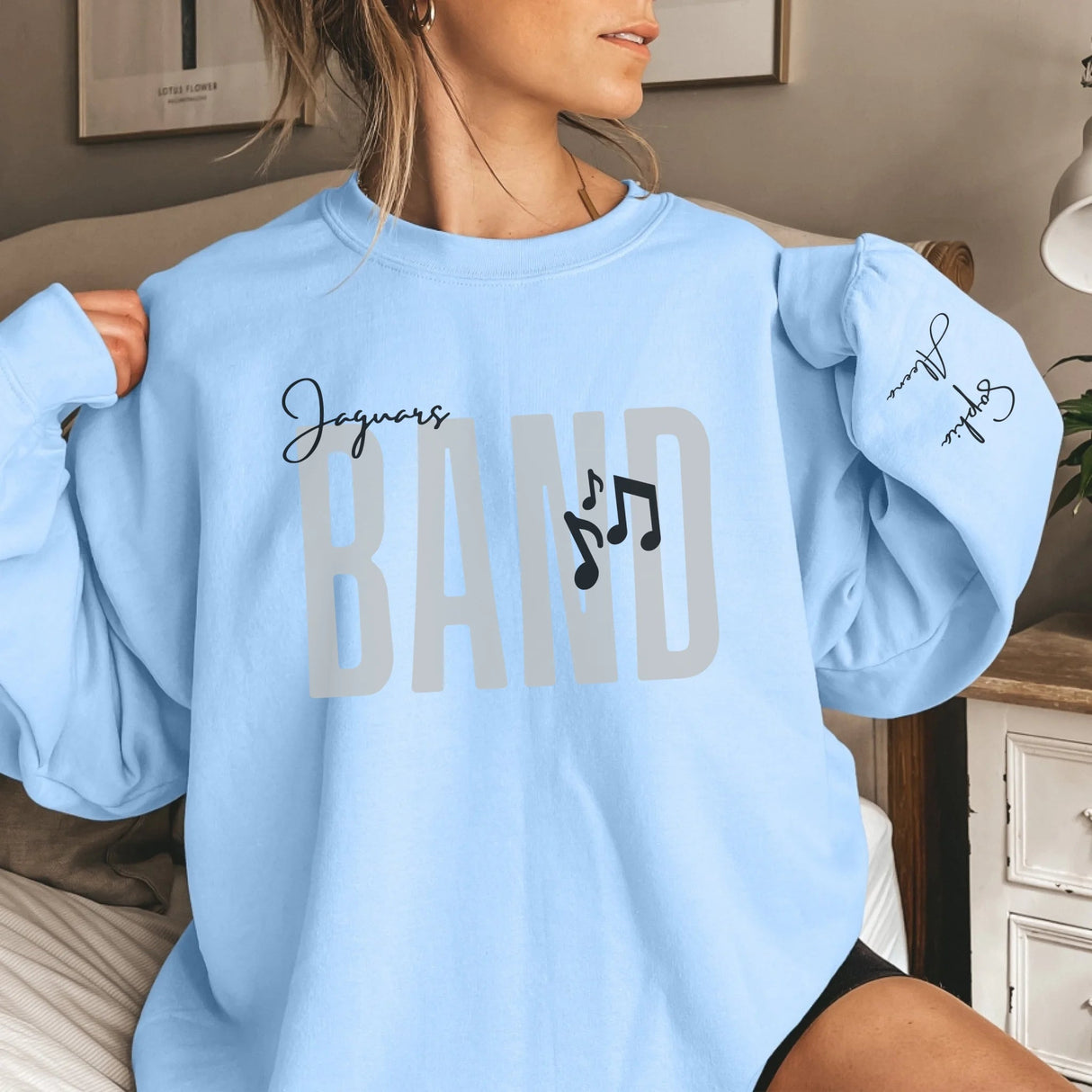 Personalized Band on a Sweatshirt With Modern Bold Design and Musician Name on Sleeve on a Sweatshirt