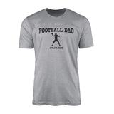 Football Dad with Football Player Icon and Football Player Name on a Men's T-Shirt with a Black Graphic