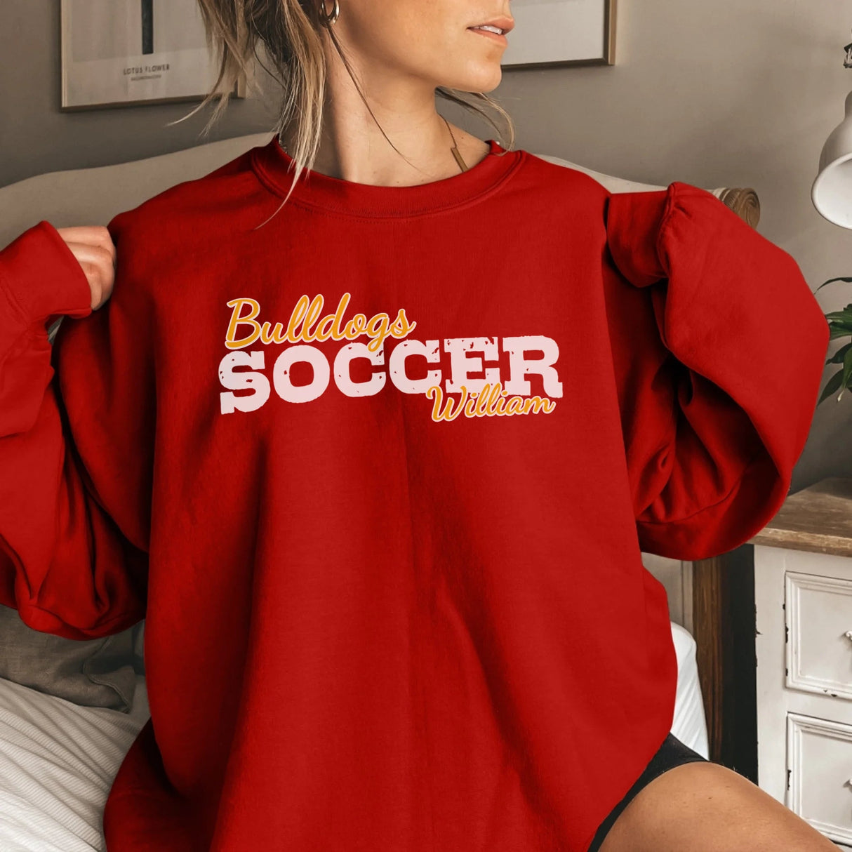 Custom Soccer Mascot and Soccer Player Name on a Sweatshirt with a White Graphic