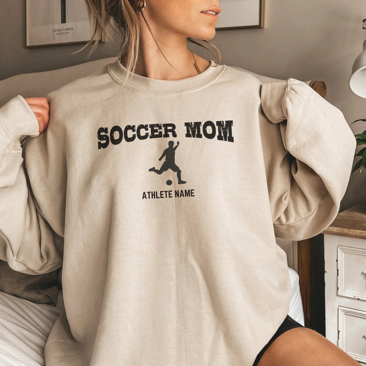 Soccer Mom with Soccer Player Icon and Soccer Player Name on a Sweatshirt with a Black Graphic