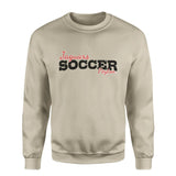 Custom Soccer Mascot and Soccer Player Name on a Sweatshirt with a Black Graphic
