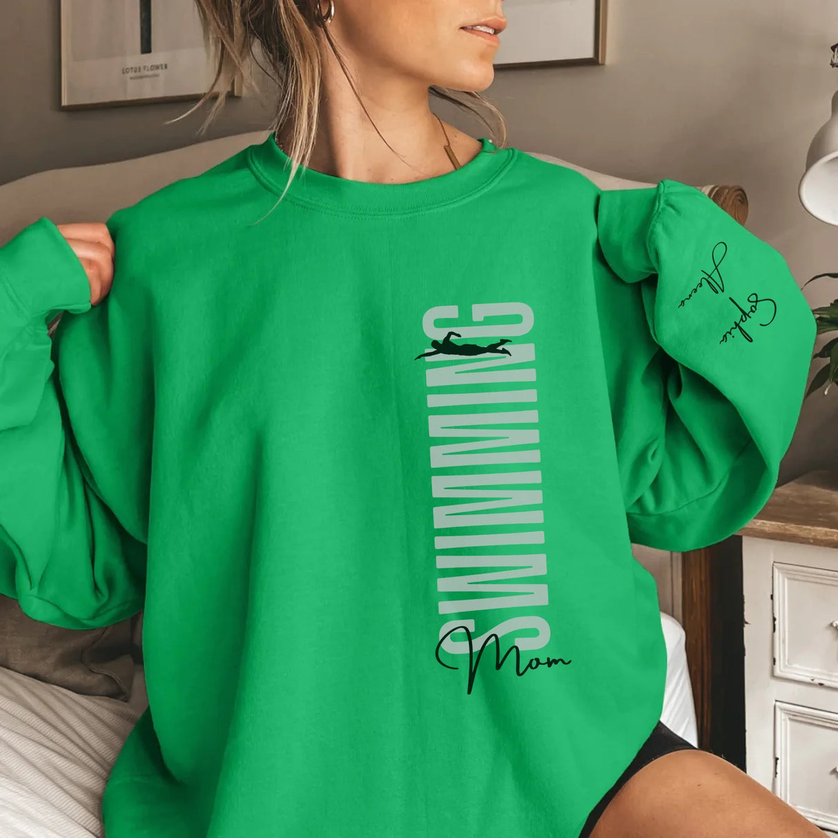 Personalized Swimming Mom on a Sweatshirt With Mascot, Icon, and Swimmer Name on Sleeve on a Sweatshirt