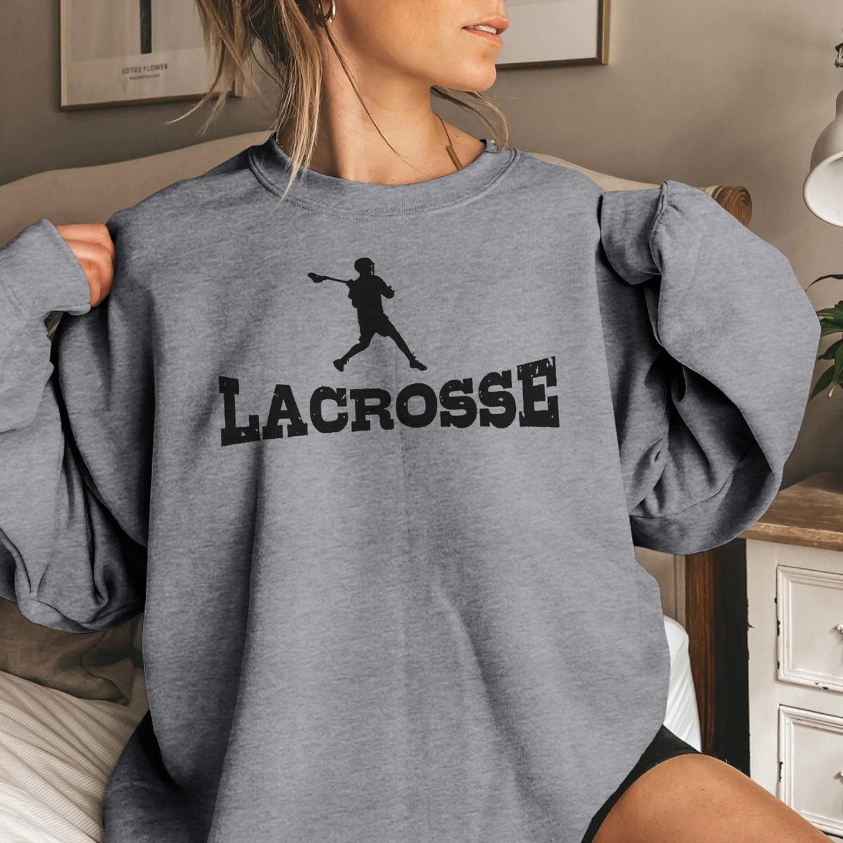 Basic Lacrosse with Lacrosse Player Icon on a Sweatshirt with a Black Graphic