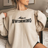 Basic Swimming with Swimmer Icon on a Sweatshirt with a Black Graphic